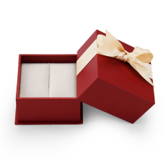 Red cardboard jewelry packaging box with bowknot