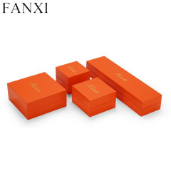 Orange leatherette paper jewellery packing box