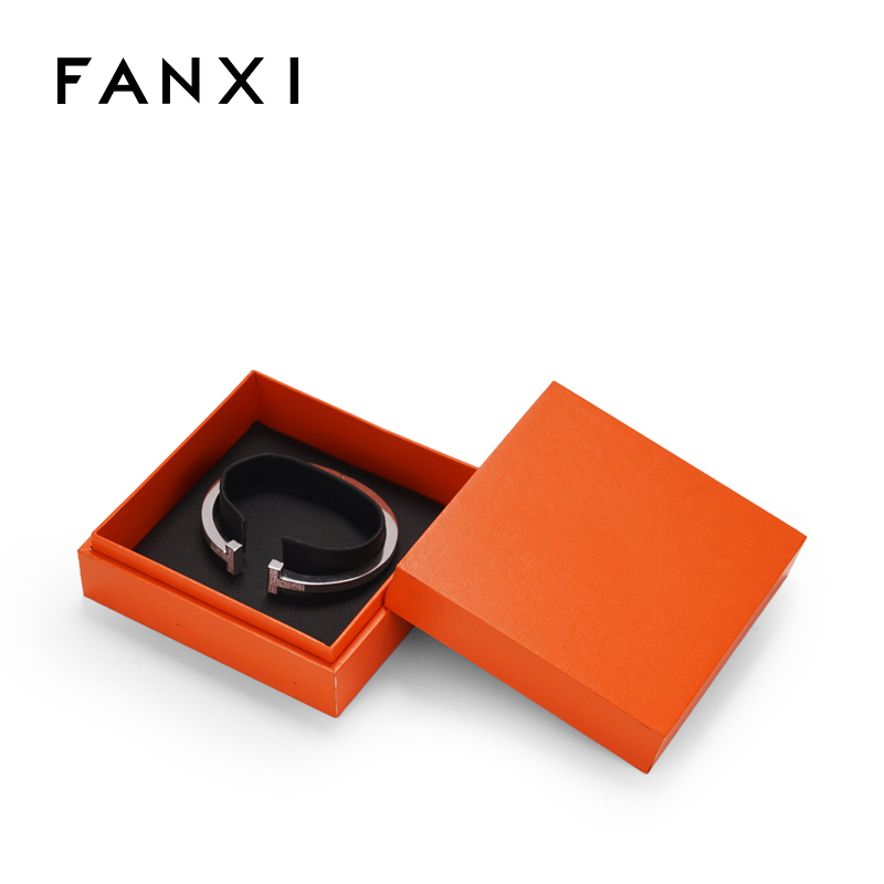 Orange leatherette paper jewellery packing box