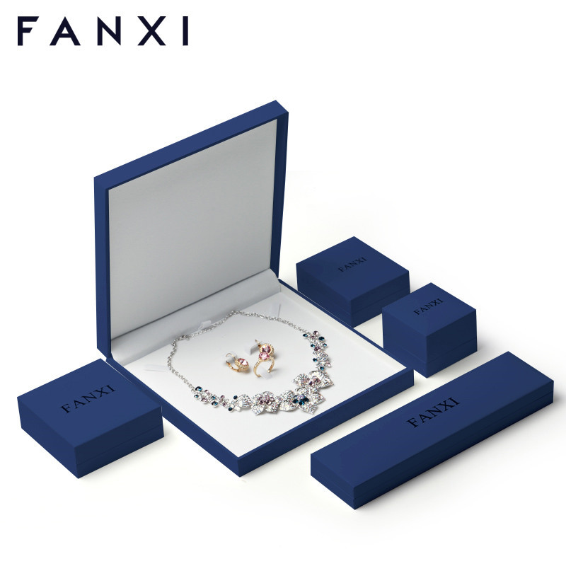 Custom logo blue jewelry packaging box with white velvet inside