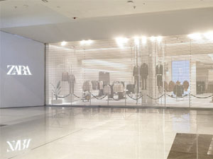 Large big size opening micro-perforated steel roller shutter doors project for ZARA shop in Dubai mall