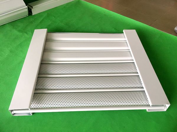 Solid slats and micro-perforated rolling shutter door slats