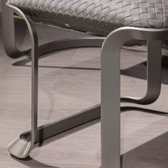 Stainless steel feet in nickel brushed chair
