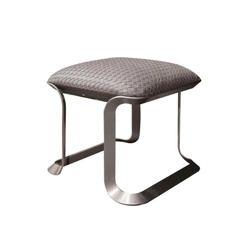 Stainless steel feet in nickel brushed chair