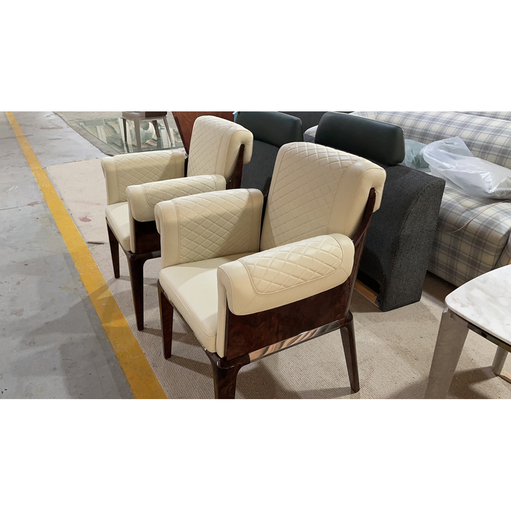 White upholstered dining chairs in modern design style