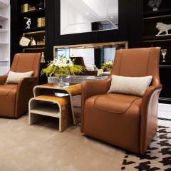 Modern high back upholstered leather armchair