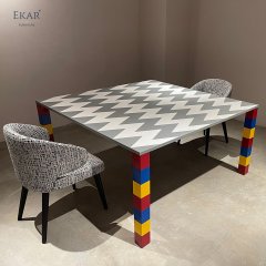 Gray and white stone mosaic tabletop, red, yellow and blue base dining table