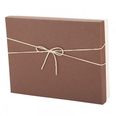 Brown  cardboard gift box with bow tie,wrapping kit