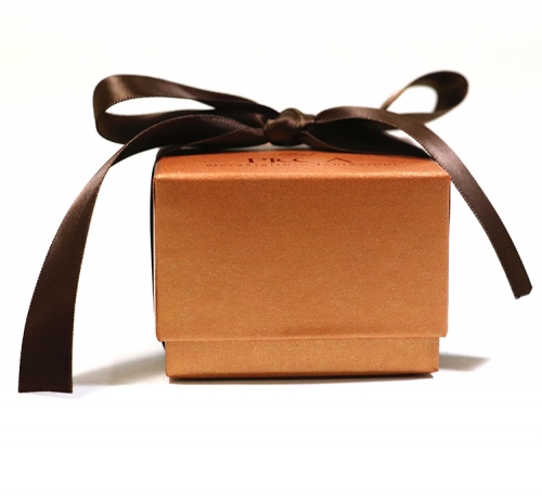 gold cardboard gift box with ribbon