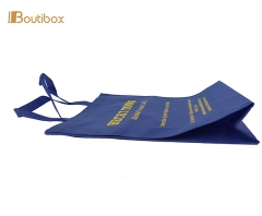 blue non-woven bag with foiled logo