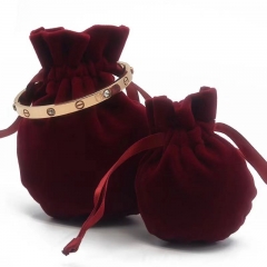 Velvet bag with ribbon drawstring closure for jewelry in round shape