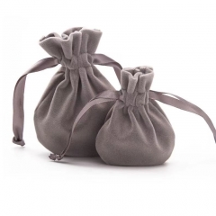 Velvet bag with ribbon drawstring closure for jewelry in round shape