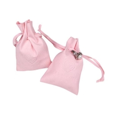 embossed logo pink suede pouch bag