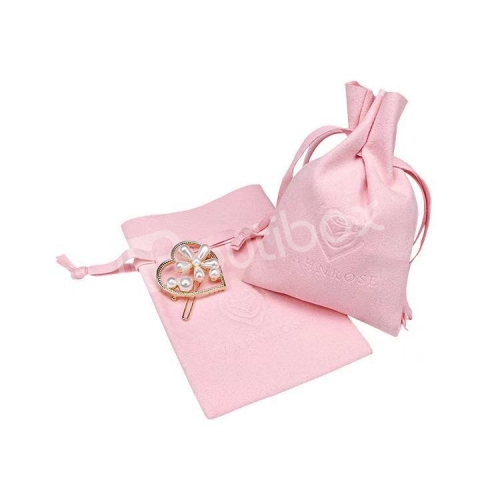 embossed logo pink suede pouch bag