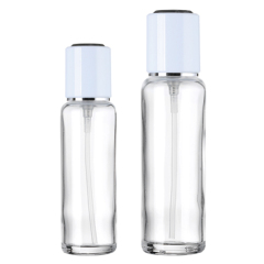 Emballage en verre transparent cylindrique de bouteille cosmétique de luxe de 40ml 100ml 150ml pour le sérum facial de lotion de beauté
