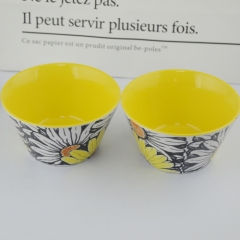 Yellow glazed interior with sunflower printing of irregularity ceramic bowl