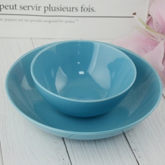 light  blue glazed ceramic plate and bowl