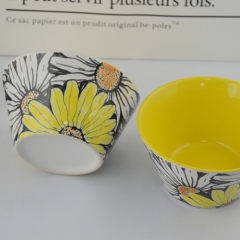 Yellow glazed interior with sunflower printing of irregularity ceramic bowl