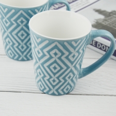 light blue 310ml mug with embossed rhombus design