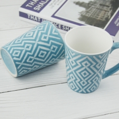 light blue 310ml mug with embossed rhombus design