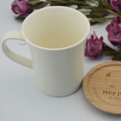 Cute emboss character designed ceramic milk coffee mug with wood lid for kids