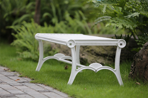 white outdoor park backless bench