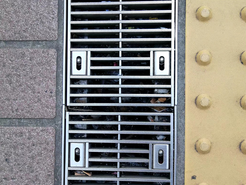 Sewer drain channel grates