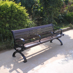 Outdoor park long metal and wood bench