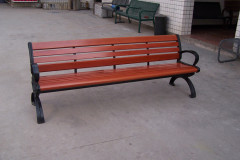 Outdoor park long metal and wood bench