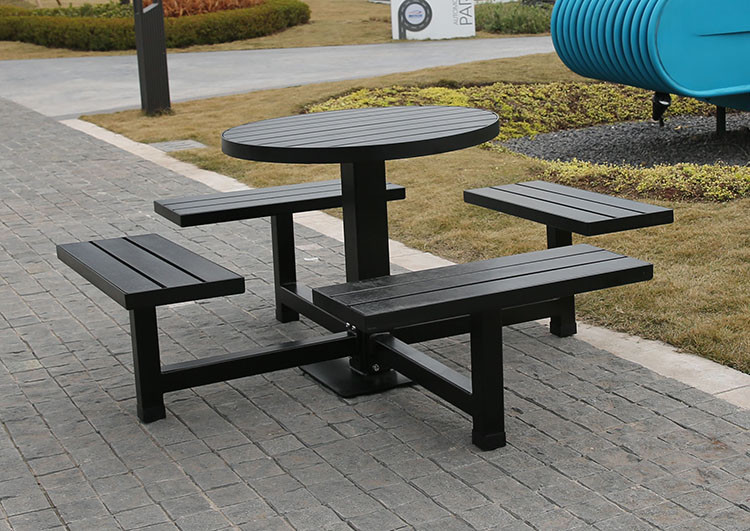 Round steel and wood picnic table with 4 seats