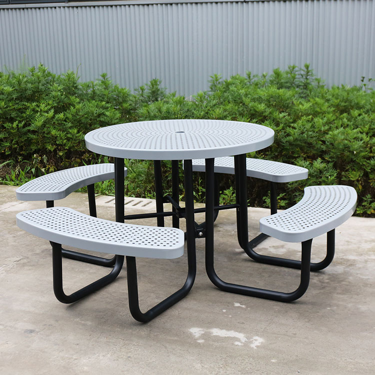 Round perforated metal picnic table with umbrella hole