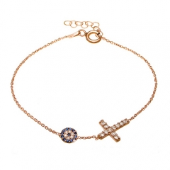 Sterling Silver White and Blue Sapphire Mini Cross and Evil Eye Bracelet