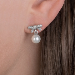 Sterling Silver Delicate Sentiments Bow Earrings with Sea Shell Pearl and Clear Cubic Zirconia 290596P