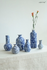 Blue and White Flower-Stamped Ceramic Vase Collection