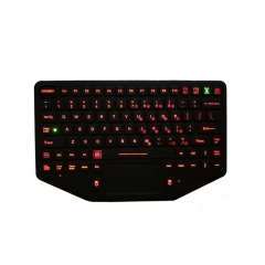 IP66 waterproof rugged glue mounted military silicone keyboard with integrated rugged touchpad mouse.