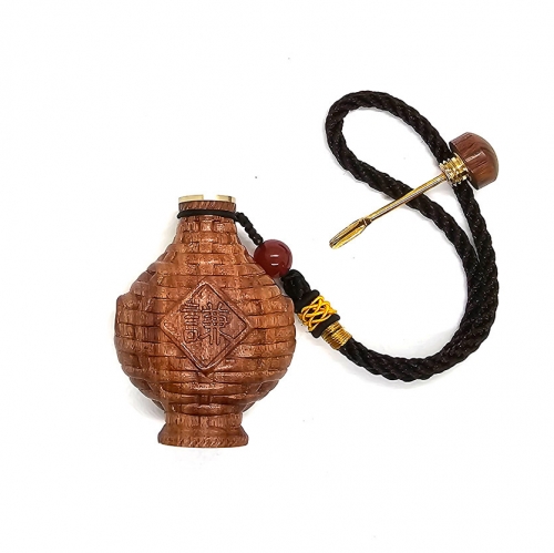 Chinese traditional snuff bottle. Qian. American rosewood with built-in brass spoon