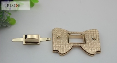 Simple custom bow-knot style gold turn lock for purse RL-BLK036