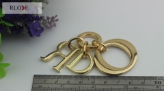 Fashion handbag metal logo gold metal letter hanging charms RL-LCP03