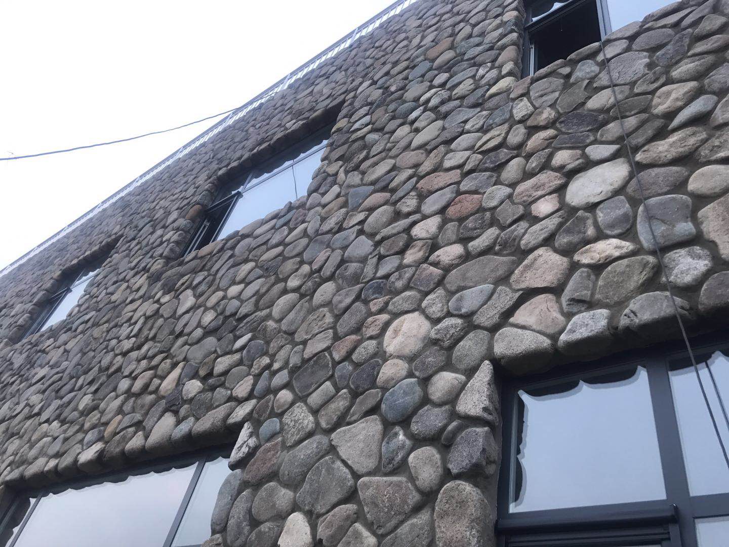 pebble stone cladding.jpg