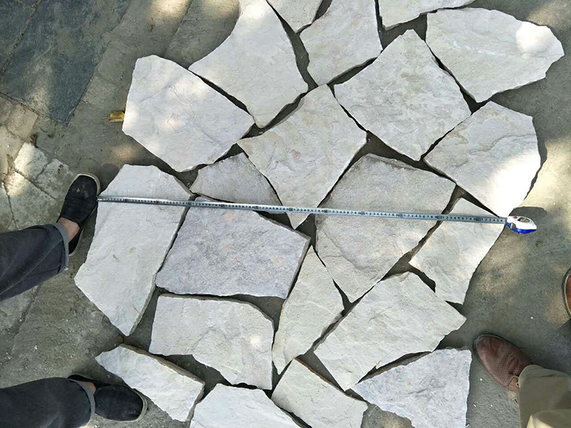 white sandstone loose stone cladding.jpg
