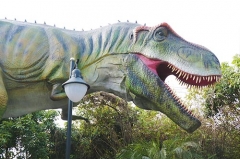 Estatua de dinosaurio robótico de tamaño natural y dinosaurio de tamaño real
