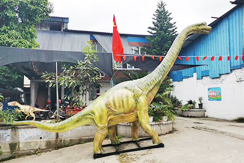 Estatua de fibra de vidrio de dinosaurio de tamaño natural al aire libre