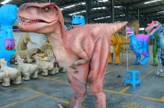 Colorful walking dinosaur suit in hidden legs