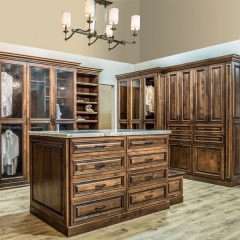 Dark stained cherry wood walk in wardrobe