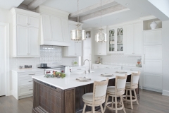 White painted transitional kitchen with dark wood island and farmhouse sink- Allandcabinet