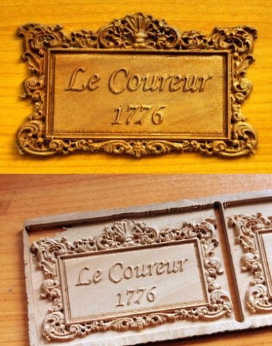 Le Coureur nameplate