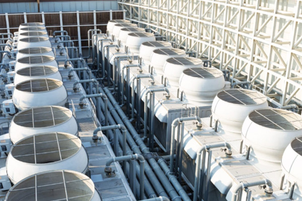 Cooling water treatment can reduce costs by decreasing charges for water consumption, lowering the costs of effluent disposal due to reduced volume, and reducing energy costs through the recovery of heat in recycled wastewater.