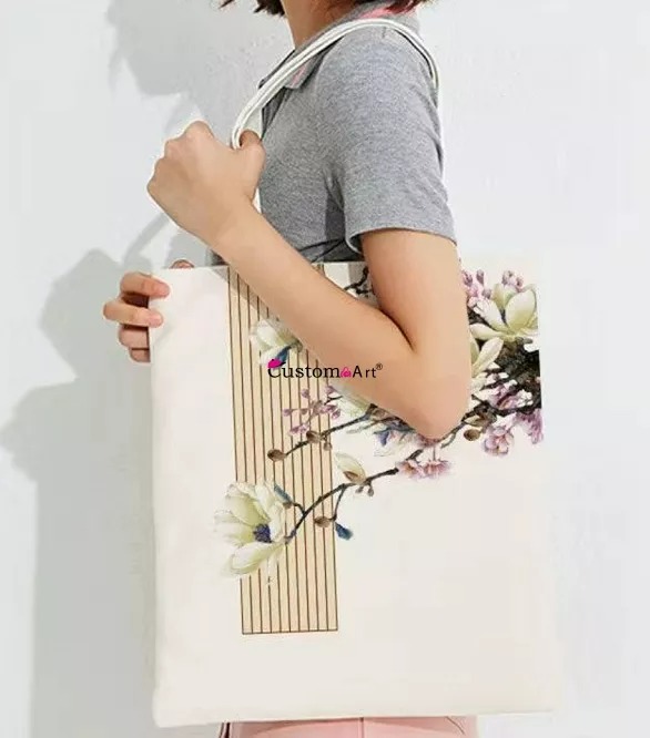 Female model carrying printed cotton shopping bag
