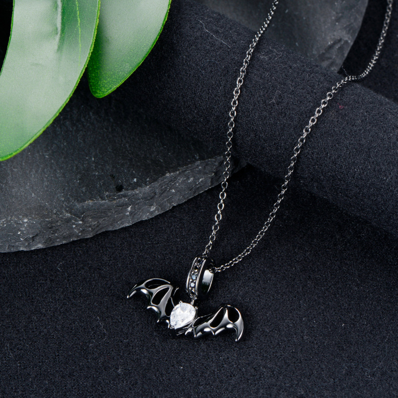 Bat in the dark pendant necklace