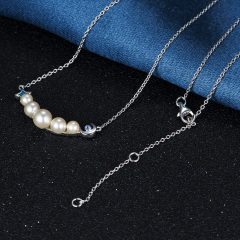 Pearl Star and Moon Necklace